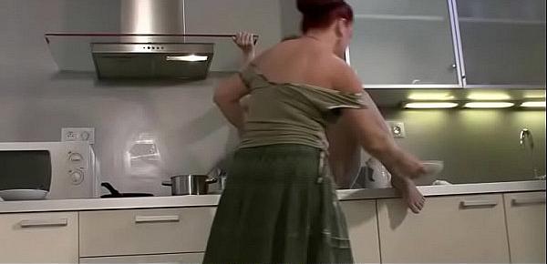  Lesbian mom and teen fucking in the kitchen